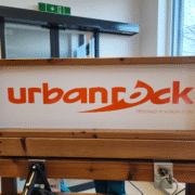 Urban Rock jackets and backpacks in mountain use, highlighting durability and design